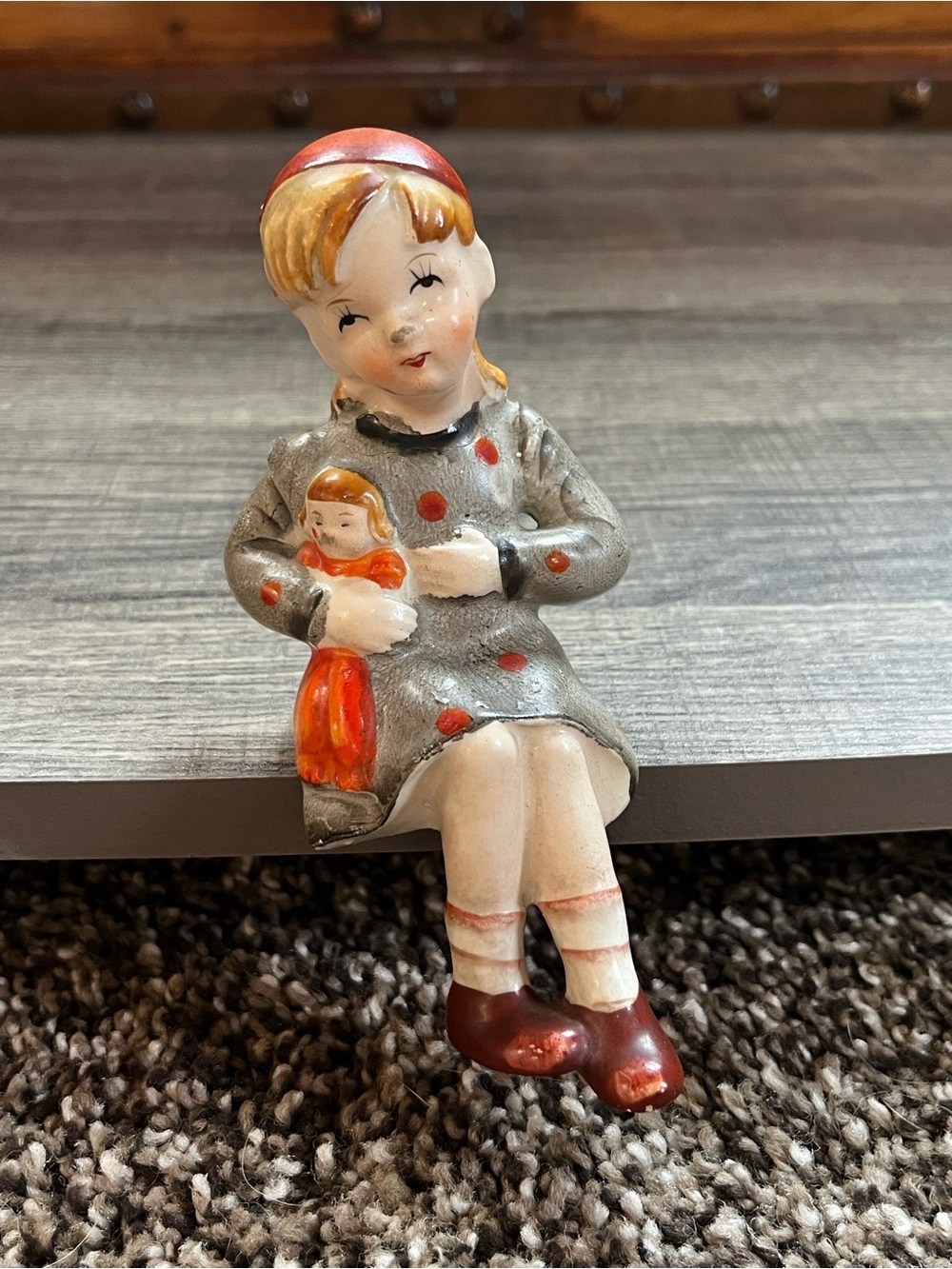 Vintage Ceramic Girl Figurine Holding Doll Occupied Japan. Damaged.